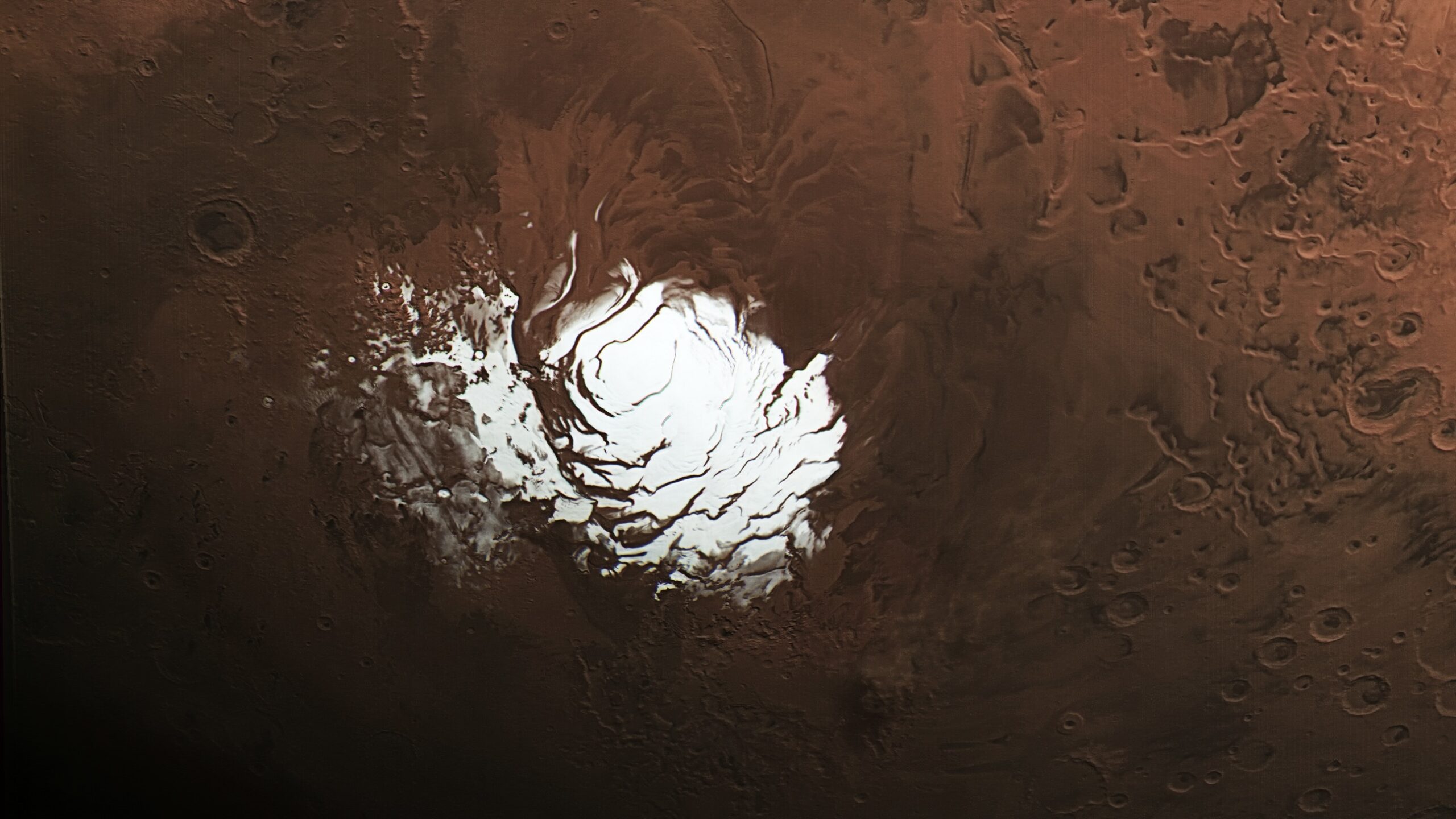 1 mars south polar cap.jpg The European Space Agency’s Mars Express orbiter captured this view of Mars’ south polar ice cap Feb. 25, 2015. Three years later, the spacecraft detected a signal from the area to the right of the ice cap that scientists interpreted as an underground lake.