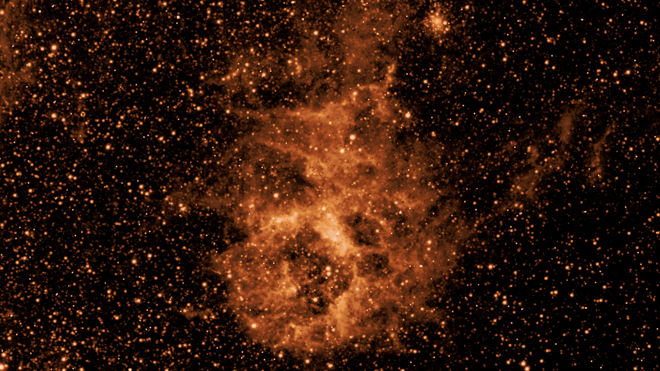 1 pia26352 spherexs dust cloud reveal.jpg Infrared image of a glowing orange dust cloud in space, surrounded by a dense field of stars against a dark background, captured by NASA’s SPHEREx mission.