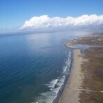 NASA Space Station Sensor Detects California Coastal Contamination Plumes flowing into the Pacific Ocean from the heavily polluted Tijuana River, seen here with the San Diego sky-line to the north