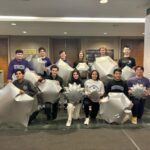 2024 Breakthrough Ideas in Initial Development Stage Northwestern University team members pose with lunar inflatable prototypes from their METALS project in NASA’s 2024 BIG Idea Challenge.
