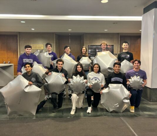 2024 Breakthrough Ideas in Initial Development Stage Northwestern University team members pose with lunar inflatable prototypes from their METALS project in NASA’s 2024 BIG Idea Challenge.
