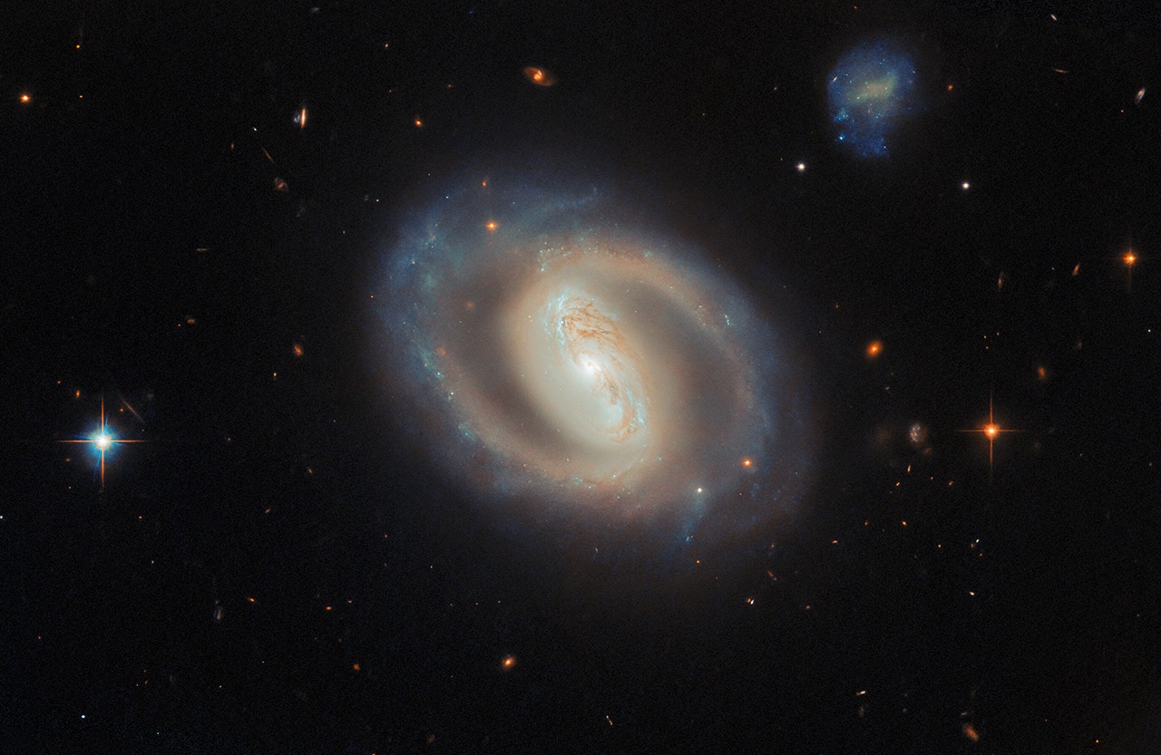 Hubble Spies an Active Spiral - NASA Science