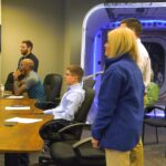 NASA Update: October 2024 Lagniappe Edition The NASA Stennis Autonomous Systems Laboratory team and John Bailey, then acting center director of NASA Stennis, are shown at NASA’s Stennis Space Center watching the launch of the Sidus Space LizzieSat-1 (LS-1) small satellite into space