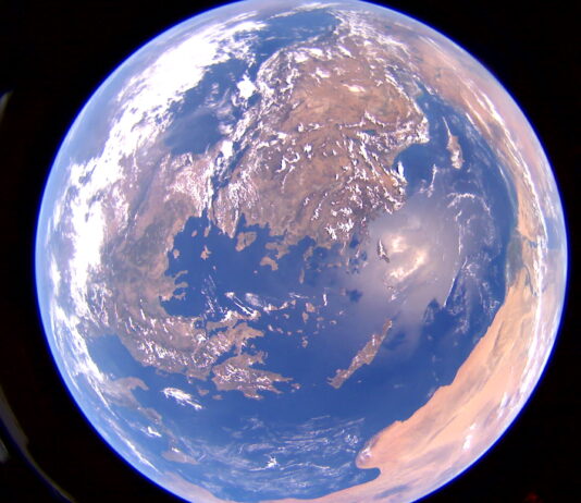 NASA Tests New Solar Array Technology on Pathfinder Spacecraft View of Earth from orbit, appearing as a globe, fully illuminated with sunlight.