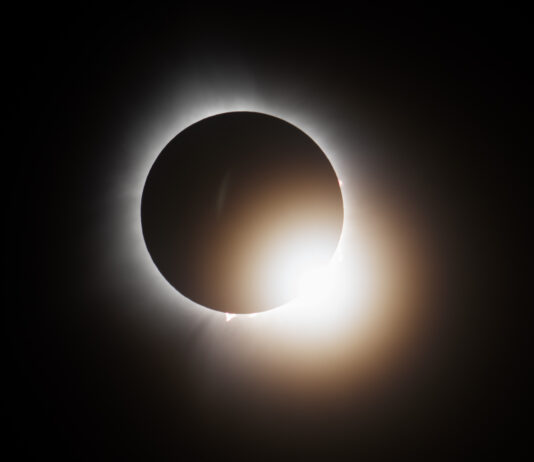 Top 2024 Event: Total Solar Eclipse Over Indianapolis The Moon covers the Sun completely, with one last bit of brightness showing. The sky is dark all around.