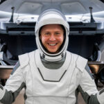 Nick Hague Advances Space-Based Human Health Research NASA’s SpaceX Crew-9 commander Nick Hague is pictured in his flight suit during training at SpaceX headquarters in Hawthorne, California. Hague will perform human health and performance research on the International Space Station as part of his mission (Credit: SpaceX).