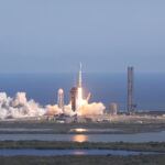 NASA’s Europa Clipper Launches on Journey to Jupiter’s Ocean Moon A SpaceX Falcon Heavy rocket carrying NASA’s Europa Clipper spacecraft launches off the coast of Florida, with blue skies and ocean in the background.