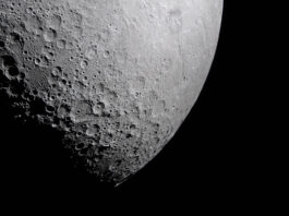 NASA Explores New Frontiers in Light Research Part of the Moon stands out against the blackness of space. Its surface is marked with many craters of different sizes. The craters are mostly on the left and bottom. The upper right portion of the Moon
