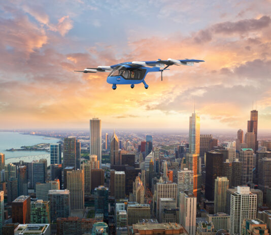 Understanding AI: A Guide for Middle Schoolers by NASA Artist illustration of an unmanned passenger aircraft in flight during sunrise in the city.