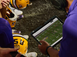iPad partners with college football, revolutionizing the game. Driving the game forward: iPad teams up with college football