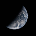 NASA Explores Earth’s Day and Night Cycle in New Study Image of Earth split by the terminator line. The terminator divides Earth’s surface diagonally, shrouding the top left half in darkness. Earth’s illuminated surface is mostly blue and covered in swirling white clouds.