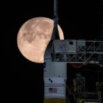 NASA Update on National Space Policy Implementation: What to Expect The Moon is seen shining over the SLS (Space Launch System) and Orion spacecraft, atop the mobile launcher on February 1, 2026. The rocket is currently at Launch Pad 39B at NASA’s Kennedy Space Center in Florida, as teams are preparing for a wet dress rehearsal to practice timelines and procedures for the launch of Artemis II.