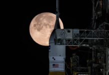 NASA Update on National Space Policy Implementation: What to Expect The Moon is seen shining over the SLS (Space Launch System) and Orion spacecraft, atop the mobile launcher on February 1, 2026. The rocket is currently at Launch Pad 39B at NASA’s Kennedy Space Center in Florida, as teams are preparing for a wet dress rehearsal to practice timelines and procedures for the launch of Artemis II.