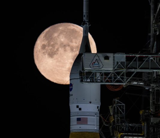 NASA Update on National Space Policy Implementation: What to Expect The Moon is seen shining over the SLS (Space Launch System) and Orion spacecraft, atop the mobile launcher on February 1, 2026. The rocket is currently at Launch Pad 39B at NASA’s Kennedy Space Center in Florida, as teams are preparing for a wet dress rehearsal to practice timelines and procedures for the launch of Artemis II.