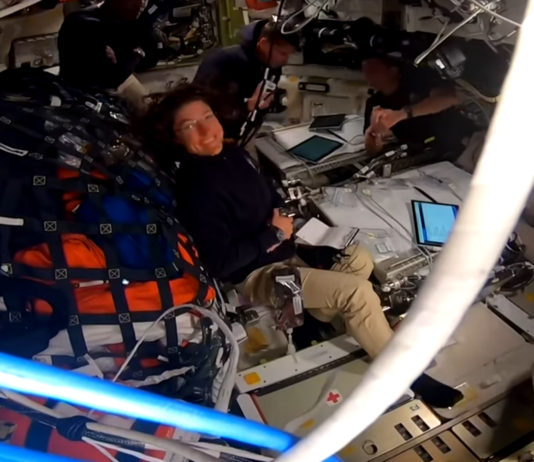 NASA’s Artemis II Sets Record for Farthest Human Spaceflight The Artemis II crew floats in Orion; NASA astronaut Christina Koch smiles at the camera as NASA a