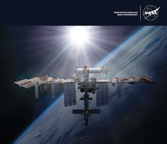 NASA Advisory Panel Unveils 2024 Safety Report Annual report cover art featuring the International Space Station orbiting the Earth, with the sun shining behind it. The NASA logo is in the top left corner. The title at the bottom says,