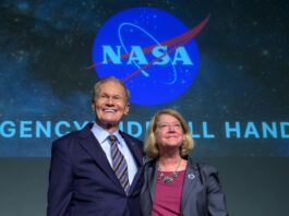 NASA Officials to Communicate with Space Station Astronauts NASA Administrator Bill Nelson, and NASA Deputy Administrator Pam Melroy, react as they are recognized by employees during a NASA agencywide all hands on Dec. 6, 2024, at the NASA Headquarters Mary W. Jackson Building in Washington.