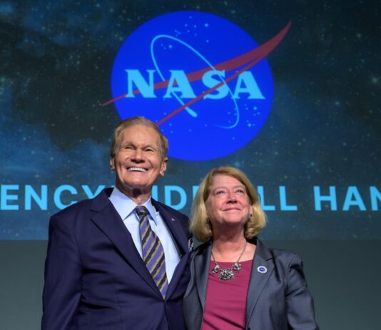 NASA Officials to Communicate with Space Station Astronauts NASA Administrator Bill Nelson, and NASA Deputy Administrator Pam Melroy, react as they are recognized by employees during a NASA agencywide all hands on Dec. 6, 2024, at the NASA Headquarters Mary W. Jackson Building in Washington.