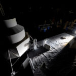 NASA Engineers Recreate Moonlight for Artemis III Landing Simulation NASA engineers inside the Flat Floor Facility at Marshall Space Flight Center in Huntsville, Alabama, mimic lander inspection and assessment tasks future Artemis astronauts may do during Artemis III. Lights are positioned at a low angle to replicate the strong shadows that are cast across the lunar South Pole.