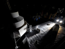 NASA Engineers Recreate Moonlight for Artemis III Landing Simulation NASA engineers inside the Flat Floor Facility at Marshall Space Flight Center in Huntsville, Alabama, mimic lander inspection and assessment tasks future Artemis astronauts may do during Artemis III. Lights are positioned at a low angle to replicate the strong shadows that are cast across the lunar South Pole.