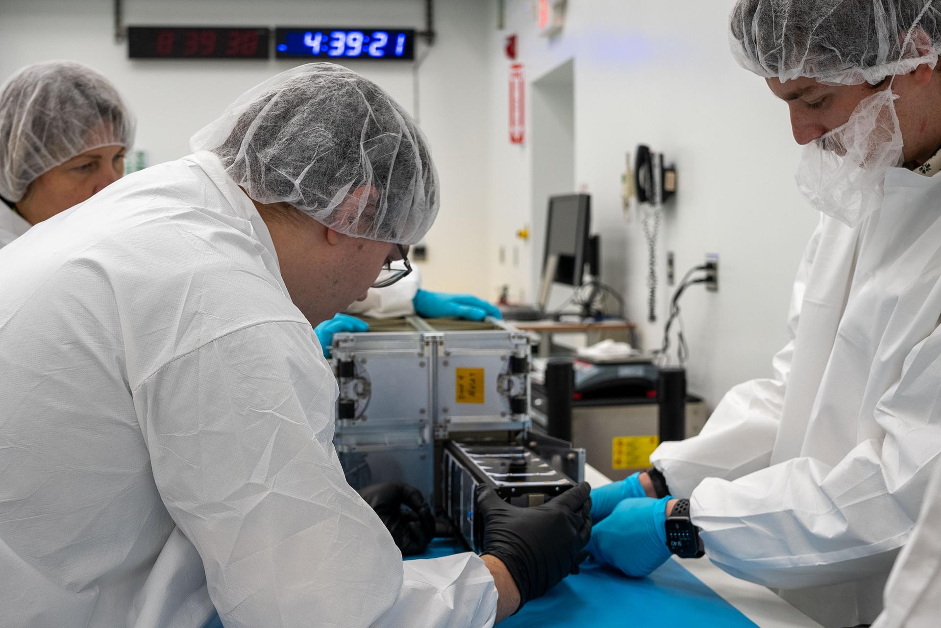 cubesat prep.jpg Technicians with the University of Kansas prepare their KUbeSat-1 for integration at Firefly’s Payload Processing Facility at Vandenberg Space Force Base, California on Thursday, April 25, 2024.