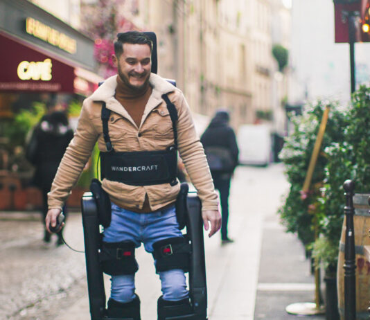 Wandercraft Launches Trials for AI-Driven Personal Exoskeleton man using exoskeleton to walk in Paris