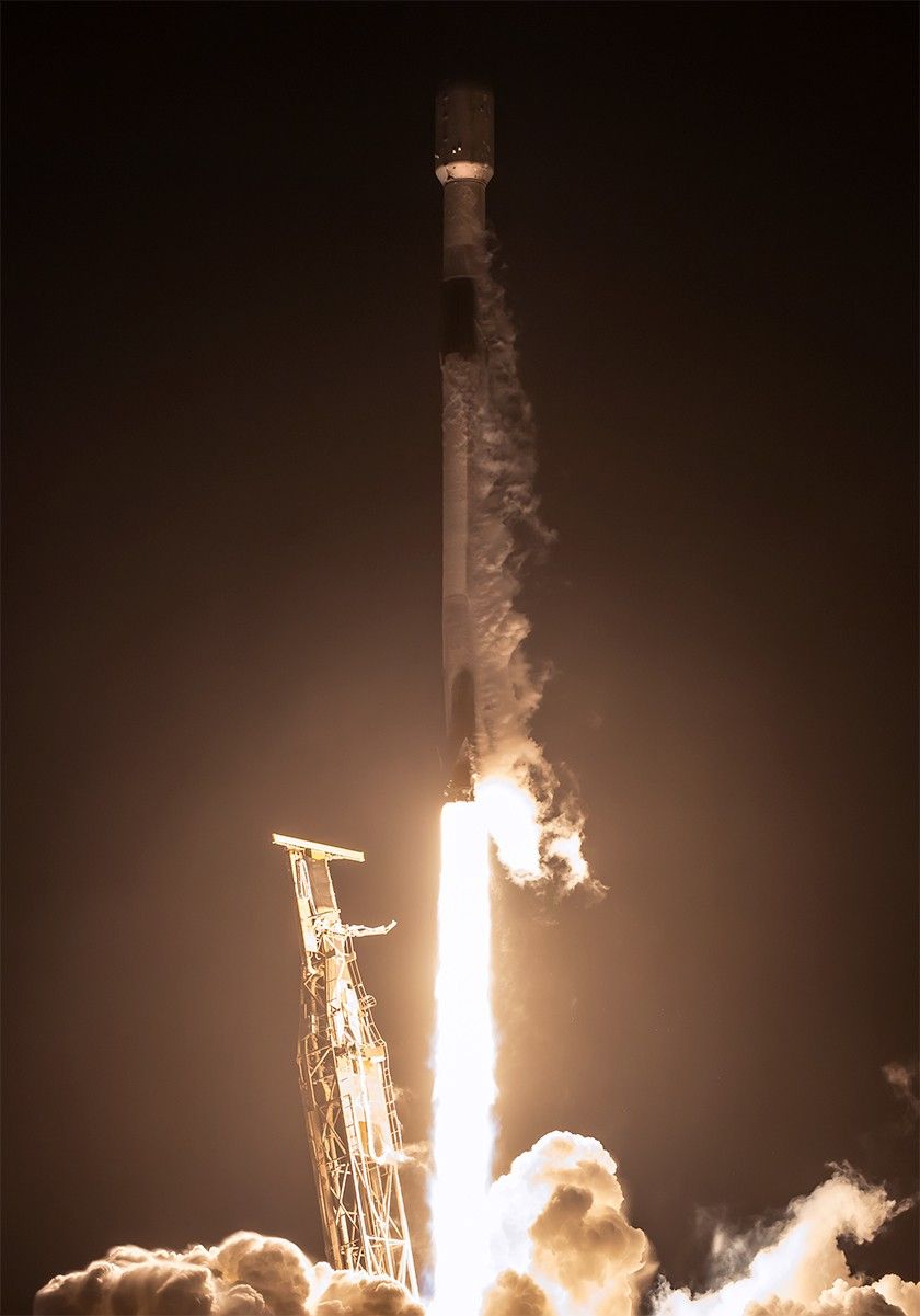 ezielaunch.jpg : A rocket lifts off from a launch pad at night, with the scene lit by rocket’s bright trail. Clouds of vapor billow out on the ground and from the rockets upper half.