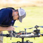 NASA Utilizes Drones for Micrometeorology and Fire Response Aid Brayden Chamberlain, UAS Pilot in Command, performs pre-flight checks on the NASA Alta X uncrewed aerial system (UAS) during NASA FireSense’s uncrewed aerial system (UAS) technology demonstration in Missoula, Montana.