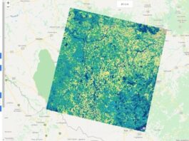 NASA’s OpenET: Addressing Western Water Supply Challenges An application interface shows a top-down view of a section of Brazil in pale tans and greens, with one square (at and angle) in bright colors: dark blue, teals, greens, and yellows.