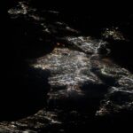 NASA Captures Los Angeles Fires from Space Station A view of Los Angeles, California from the International Space Station. The fires appear as orange lights just above center, in between two areas brightly lit by city lights.