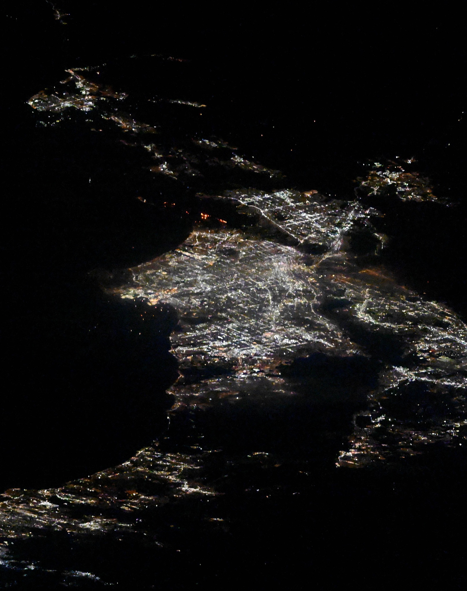 gg6dnlmxqaaqfoe.jpg A view of Los Angeles, California from the International Space Station. The fires appear as orange lights just above center, in between two areas brightly lit by city lights.
