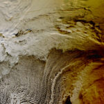 2015 Eclipse Shadow Photographed by NASA’s Terra Satellite Clouds over the Arctic Ocean almost look like the sea