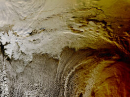 2015 Eclipse Shadow Photographed by NASA’s Terra Satellite Clouds over the Arctic Ocean almost look like the sea