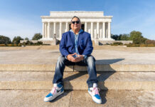 Edward Gonzales Promotes Inclusive Work Environment at NASA Edward Gonzales sitting with his hands folded on the steps in front of the Lincoln Memorial in Washington, DC.