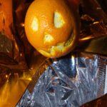 NASA Celebrates Halloween Aboard the International Space Station An orange dressed as a pumpkin for Halloween