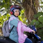How AI and Tech Skills Are Opening New Career Paths for Women in Southeast Asia – A Microsoft Perspective Woman wearing helmet riding a motorbike.