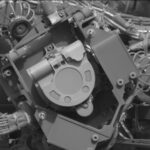 Martian Dust and Magnets: NASA’s Exploration on Sols 4536-4538 A grayscale close-up image of an instrument on the Mars rover Curiosity, showing at the center of the image a U-shaped flat piece of metal face the camera, with its rounded bottom pointing toward the lower right corner of the image. It’s surrounded by metal plates at different angles, some parallel to the plane of the image, others perpendicular, and most of them secured with hex nuts. Braided bunches of cable are twisted behind these other sections, leading into the instrument.