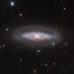 NASA’s Hubble Investigates Active Galactic Core NASA Logo