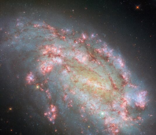 Hubble Reveals Stunning Multiwavelength Galaxy Image NASA Logo