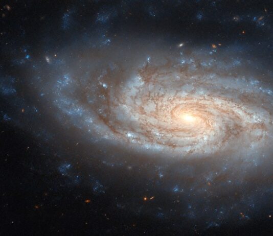 NASA’s Hubble Captures Stunning Spiral Galaxy Image NASA Logo