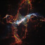 Hubble Captures Image of a Star Erupting Like Volcano NASA Logo