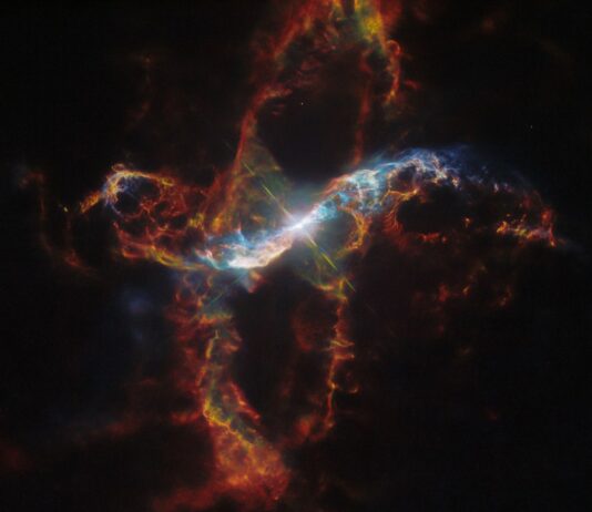 Hubble Captures Image of a Star Erupting Like Volcano NASA Logo