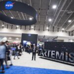NASA Showcases Space Innovation at Exploration Conference Attendees are seen by the NASA exhibit at the 70th International Astronautical Congress, Friday, Oct. 25, 2019, at the Walter E. Washington Convention Center in Washington.