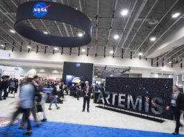 NASA Showcases Space Innovation at Exploration Conference Attendees are seen by the NASA exhibit at the 70th International Astronautical Congress, Friday, Oct. 25, 2019, at the Walter E. Washington Convention Center in Washington.