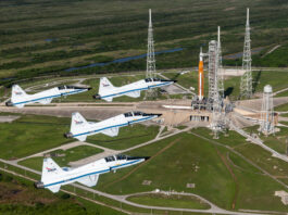NASA Johnson’s Visual Legacy: Art and Analysis Unite Collaboratively Four NASA T-38 Talon jets fly in formation over Kennedy Space Center.