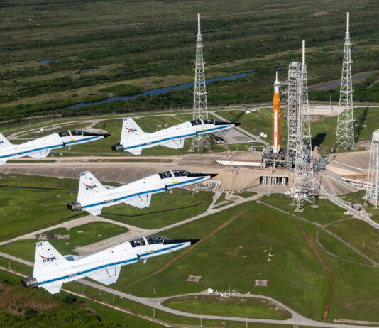 NASA Johnson’s Visual Legacy: Art and Analysis Unite Collaboratively Four NASA T-38 Talon jets fly in formation over Kennedy Space Center.