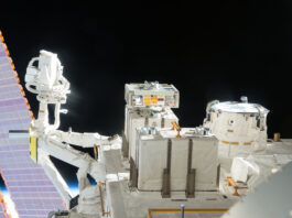 NASA Highlights: Top Station Science News for March 7, 2025 A view of an exposed module outside the International Space Station with solar panels and the darkness of space behind it.