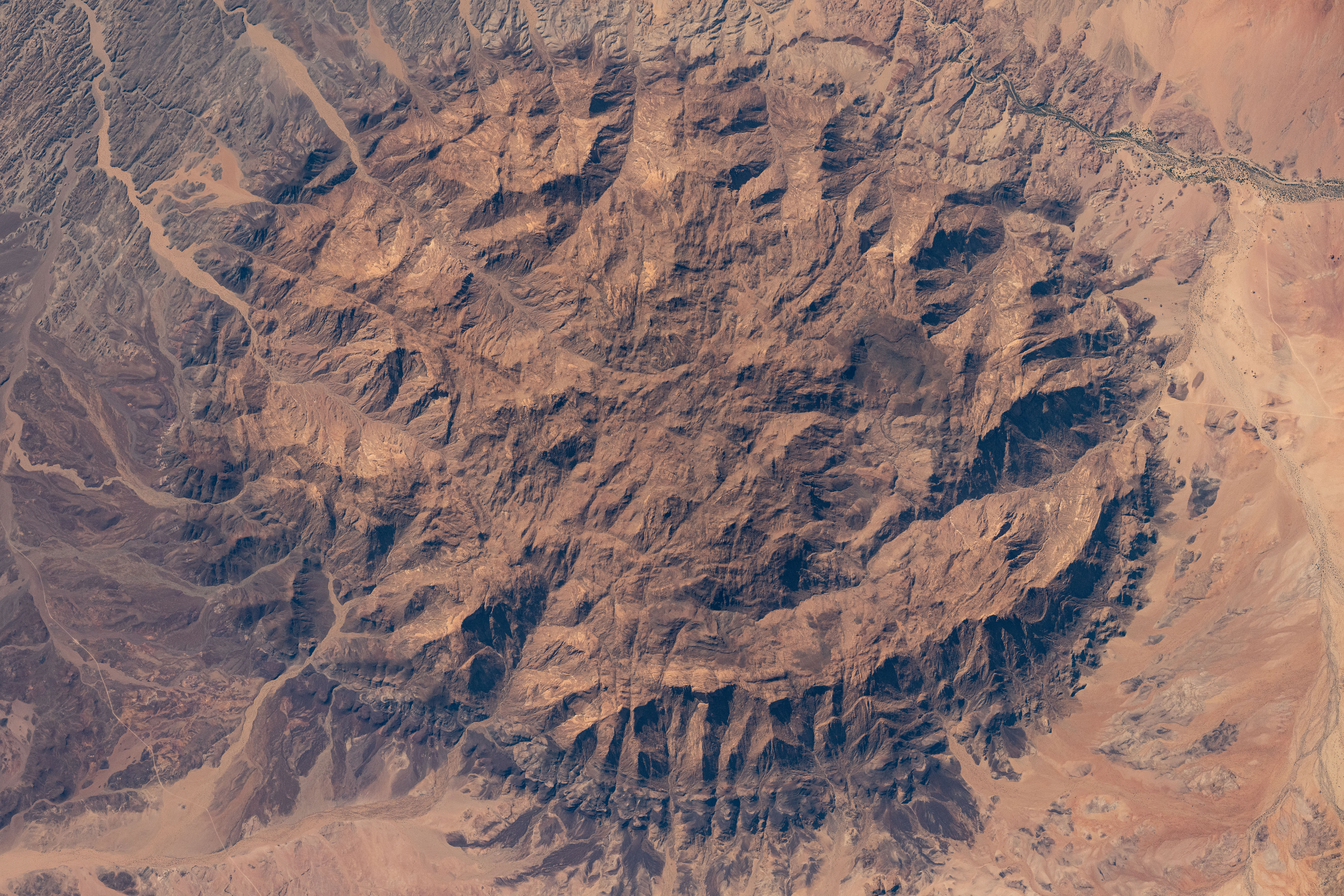 iss071e522460.jpg The dome-shaped Brandburg Massif, near the Atlantic coast of central Namibia, containing Brandberg Mountain, the African nation