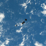 CubeSats Capture: NASA Deploys Mini Satellites into Earth Orbit Tiny satellites, also known as CubeSats, are pictured after being deployed into Earth orbit from a small satellite orbital deployer on the outside of the International Space Station