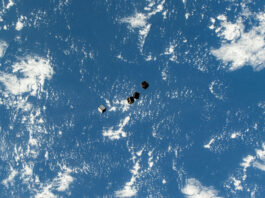 CubeSats Capture: NASA Deploys Mini Satellites into Earth Orbit Tiny satellites, also known as CubeSats, are pictured after being deployed into Earth orbit from a small satellite orbital deployer on the outside of the International Space Station